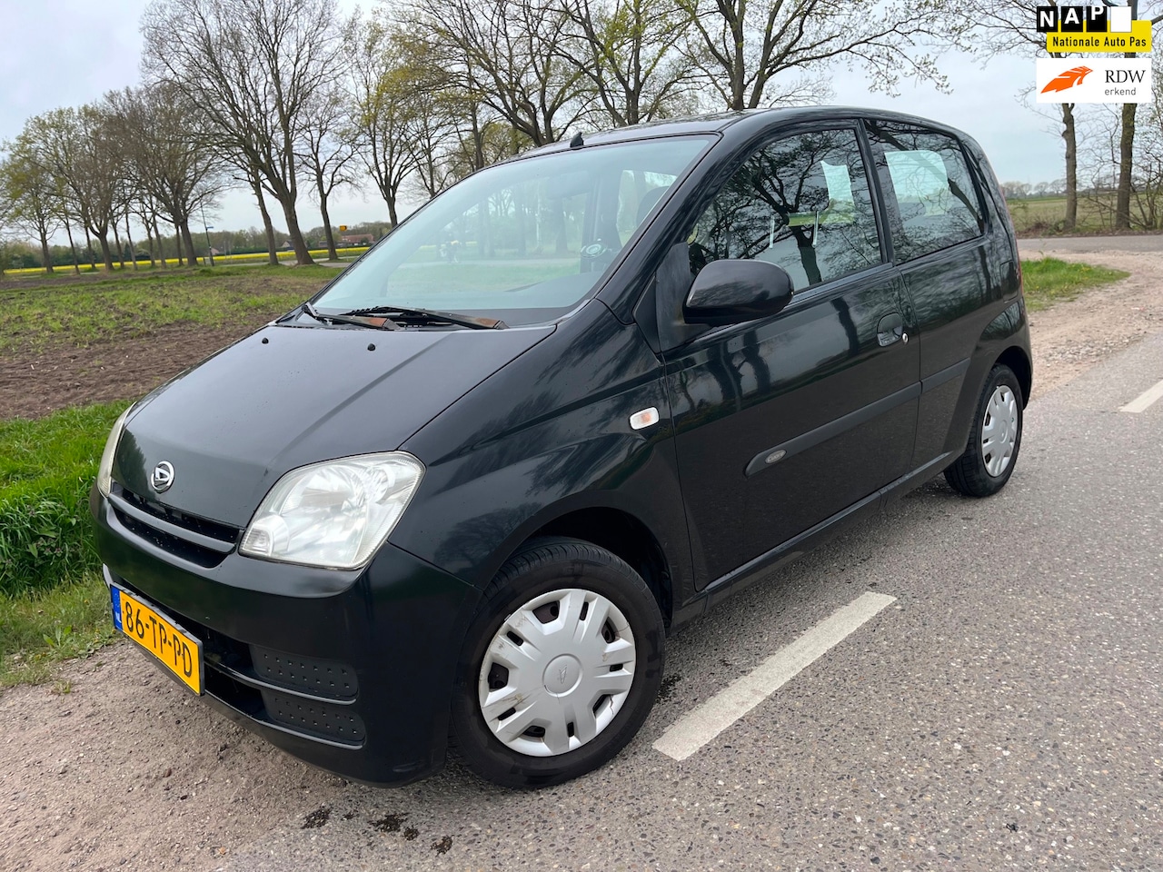Daihatsu Cuore - 1.0-12V Nagano / 80.000 airco - AutoWereld.nl