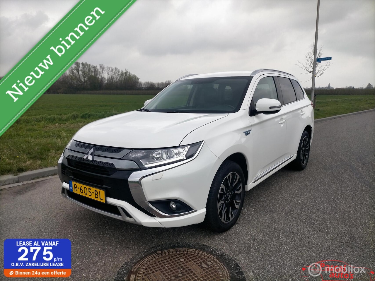 Mitsubishi Outlander - 2.4 PHEV half leder camera trekhaak - AutoWereld.nl