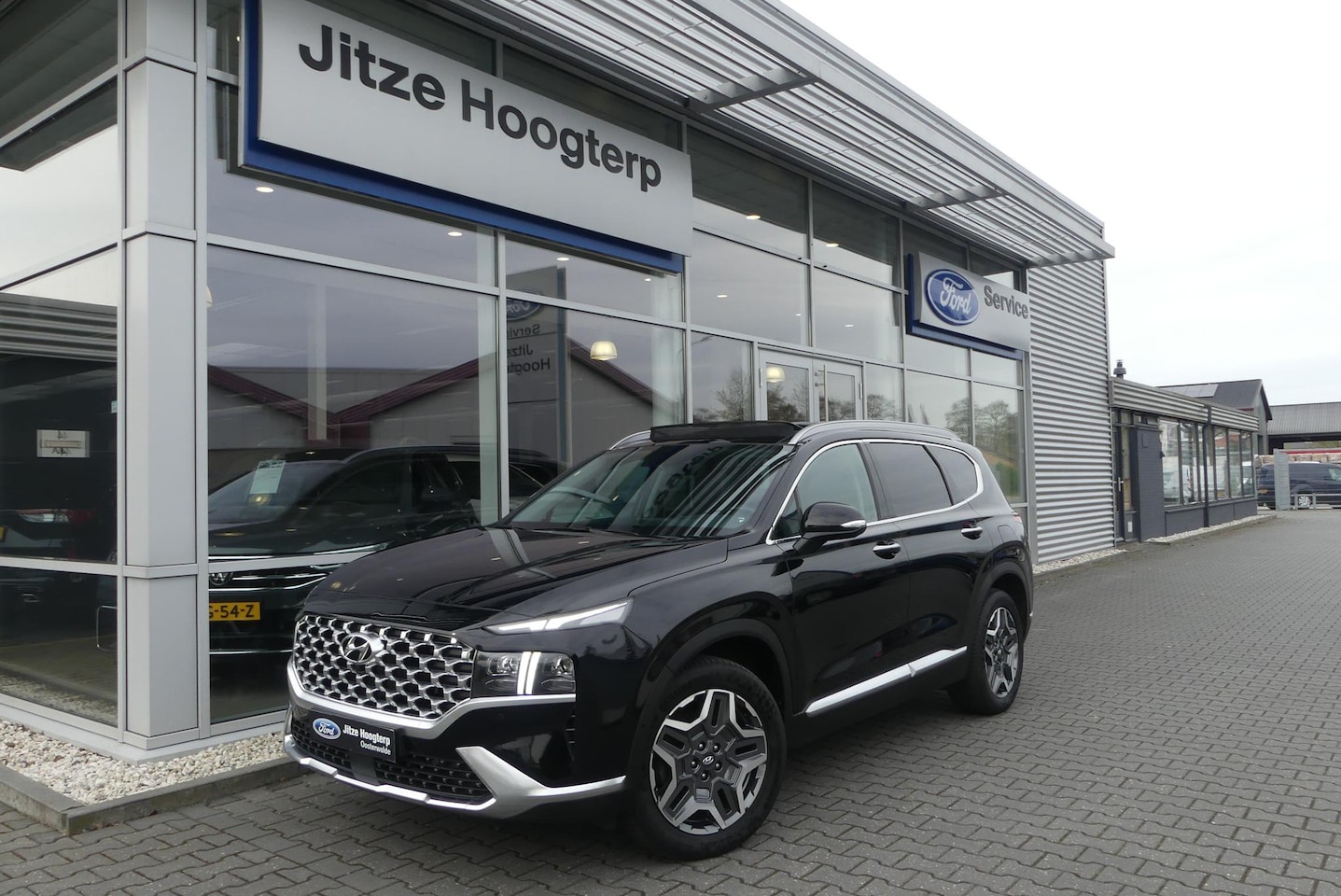 Hyundai Santa Fe - 1.6 T-GDI PHEV Premium Plus Sky 7p. TREKHAAK AFNEEMBAAR (1.350KG), PANO, 360° CAMERA, HUD, - AutoWereld.nl