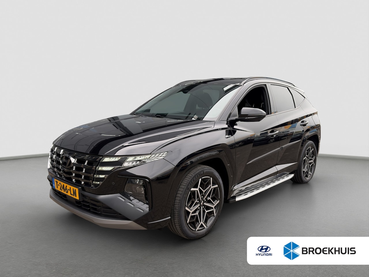 Hyundai Tucson - 1.6 T-GDI HEV 230pk N-Line | Leder | Climate | Keyless | Navigatie | Elek. Klep | Full - L - AutoWereld.nl