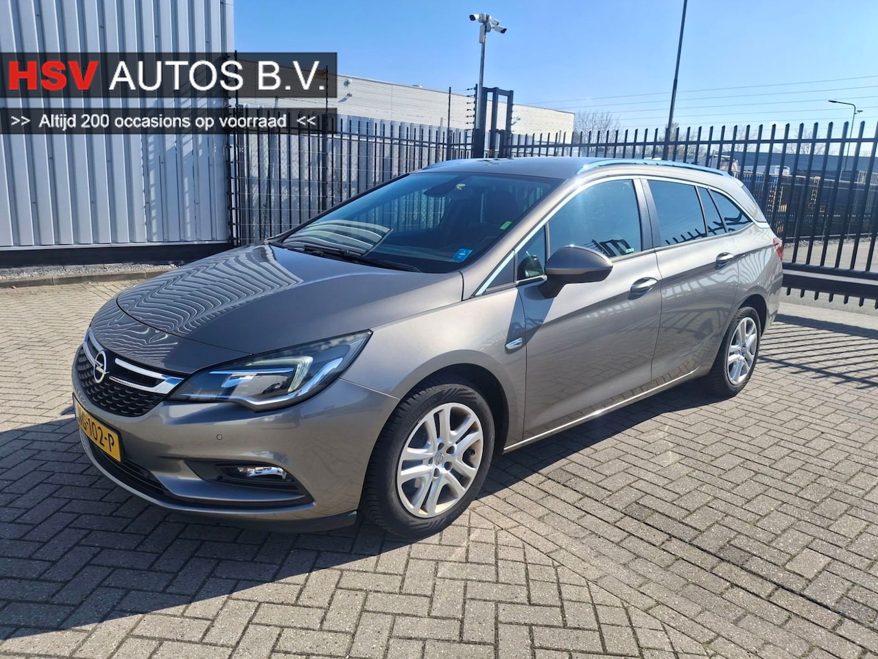 Opel Astra Sports Tourer - 1.0 Business+ navi airco trekhaak org NL - AutoWereld.nl