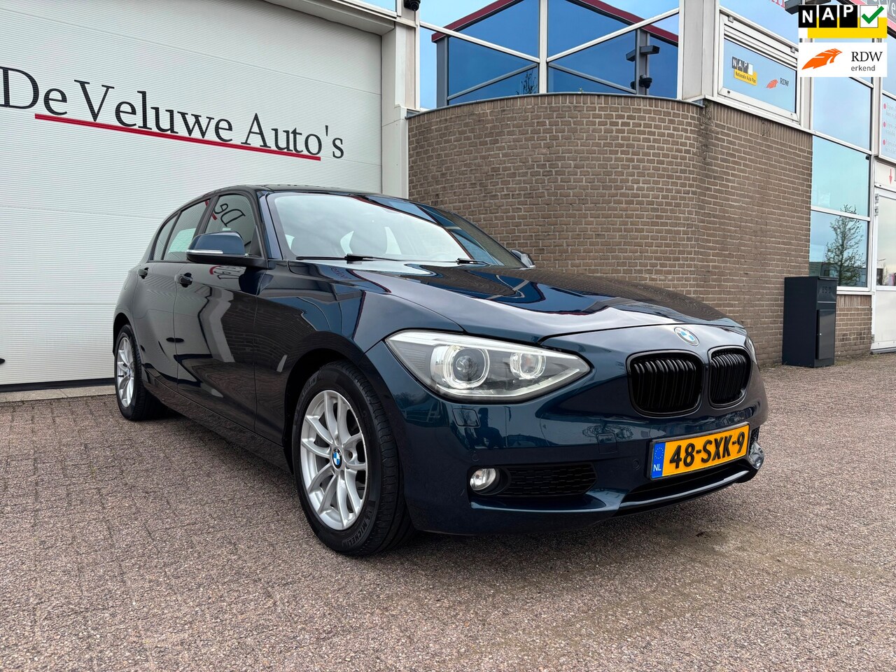 BMW 1-serie - 118i Business 170PK|Sport|Cruise|Navi|Automaat - AutoWereld.nl