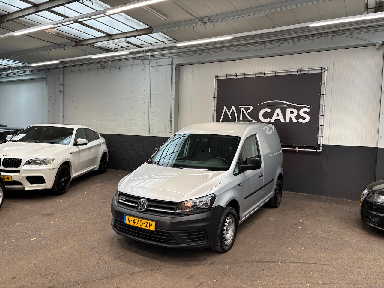 Volkswagen Caddy - 1.4 TGI L1H1 EcoFuel Trendline Airco/Cruise Control - AutoWereld.nl