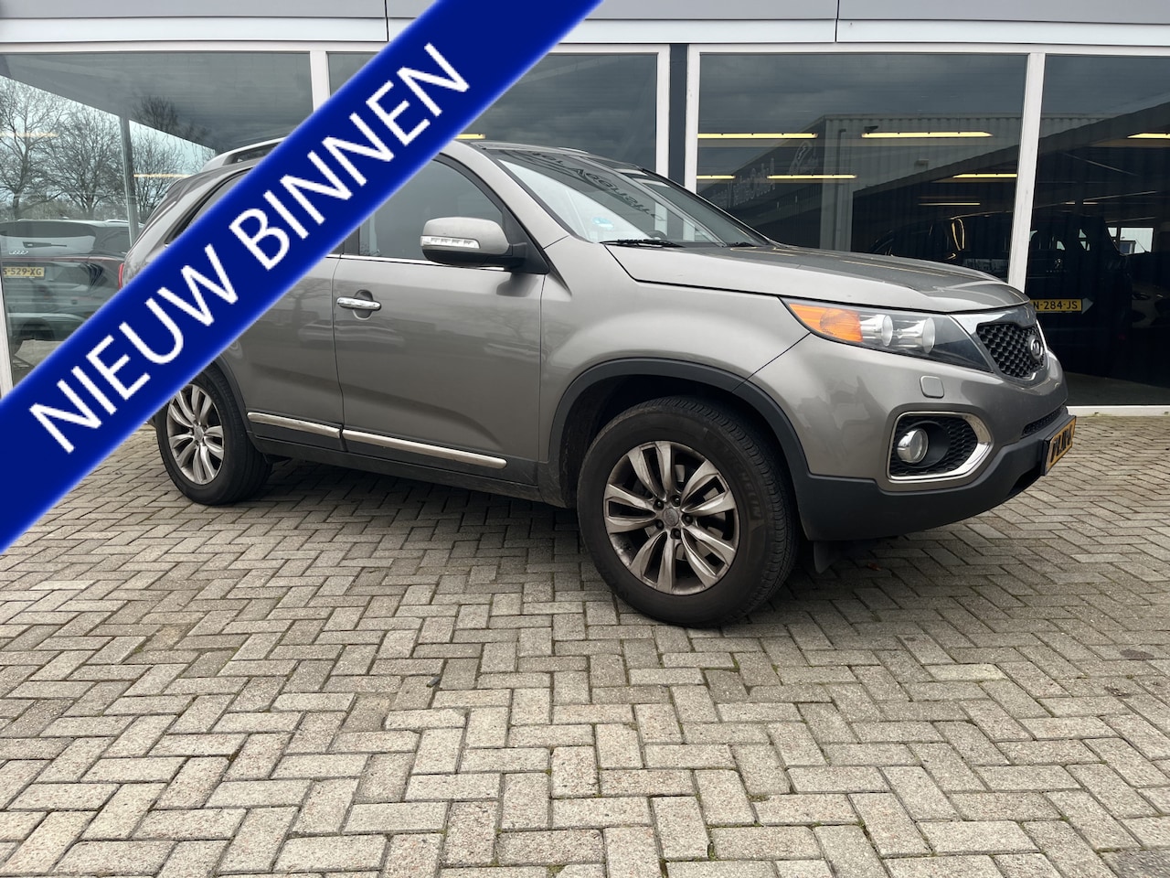 Kia Sorento - 2.4 X-clusive 7p. Cruise / Trekhaak / Leer / Schuif-kantel dak - AutoWereld.nl