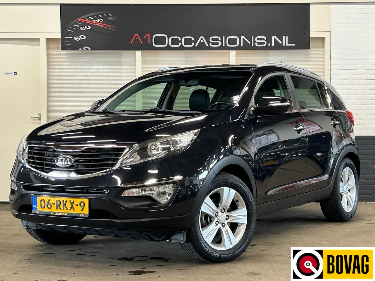 Kia Sportage - 1.6 GDI X-ecutive Plus Pack + HALF LEDER + NAVI - AutoWereld.nl