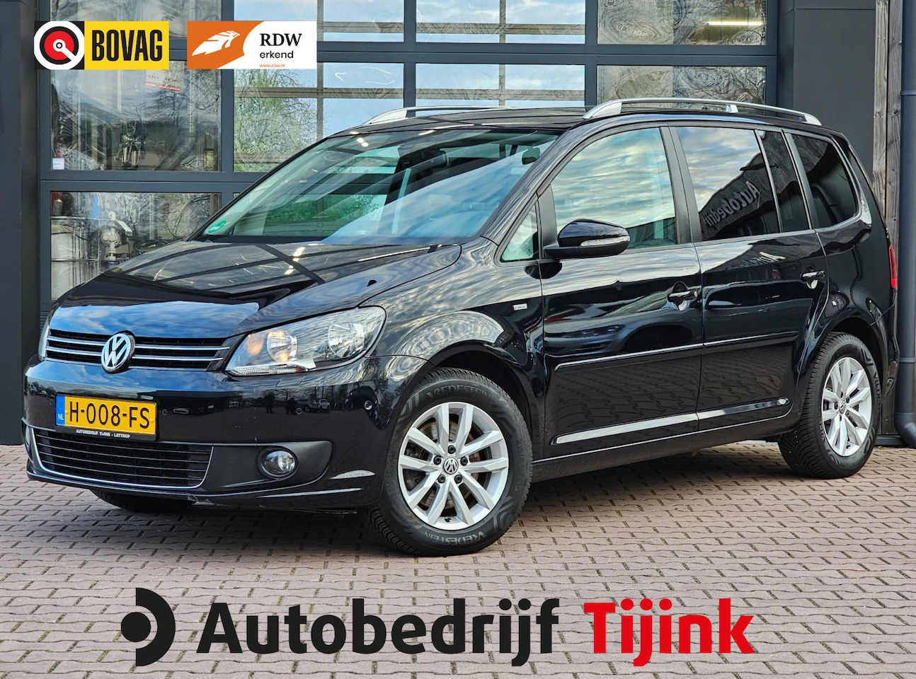 Volkswagen Touran - 1.4 TSI Comfortline | Navi | Trekhaak | Cruise | Park Assist | Light Assist | Stoelverwarm - AutoWereld.nl