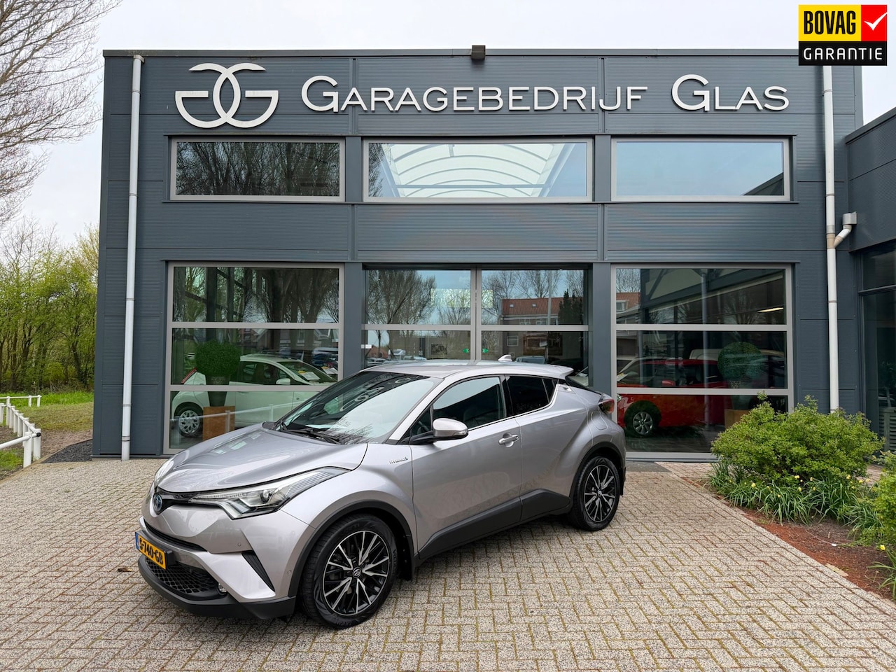 Toyota C-HR - 1.8 Hybrid dynamic - navigatie - leder - AutoWereld.nl