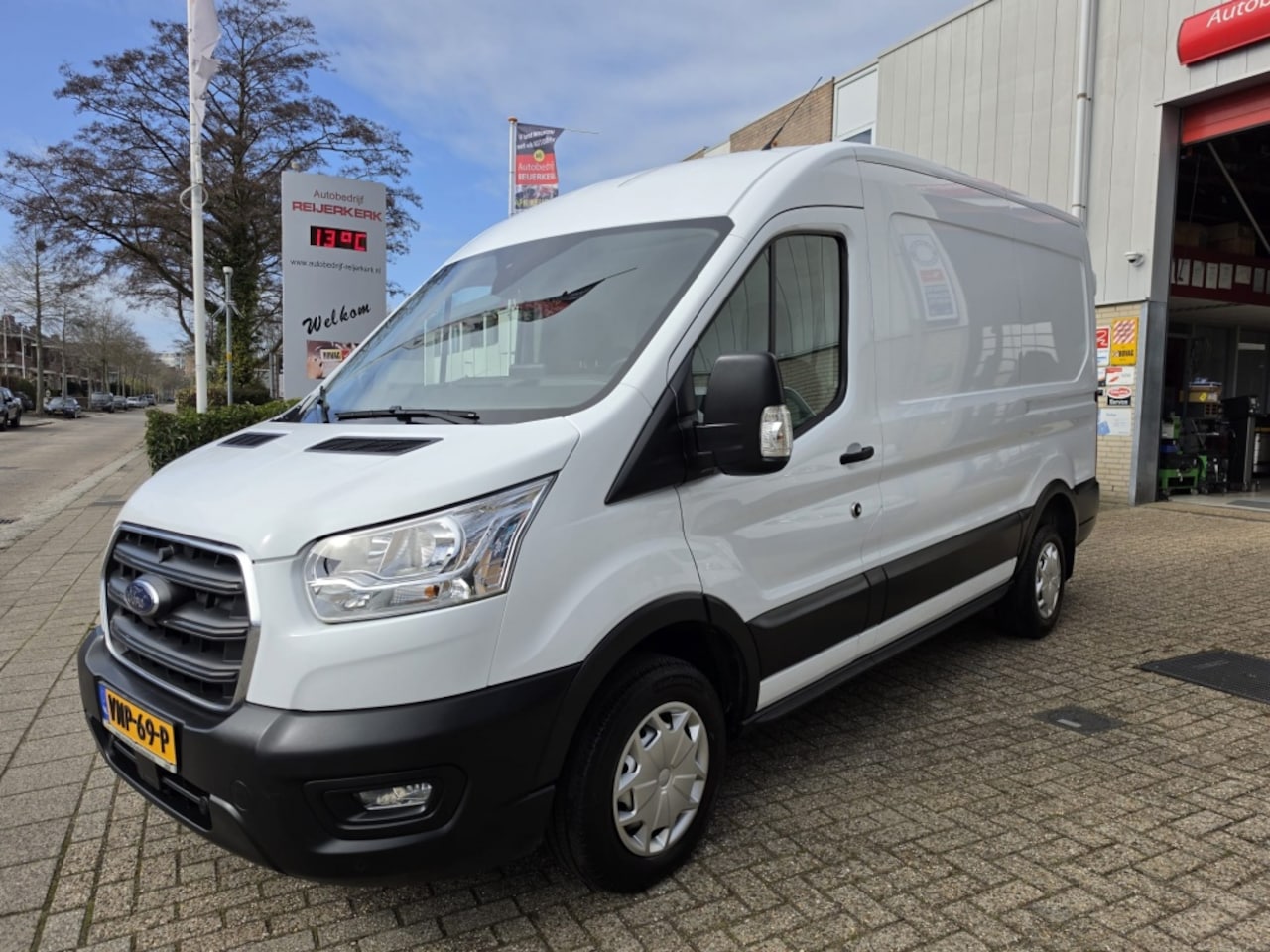 Ford Transit - 310 2.0 TDCI L2H2, Trekhaak, Camera, Navigatie - AutoWereld.nl