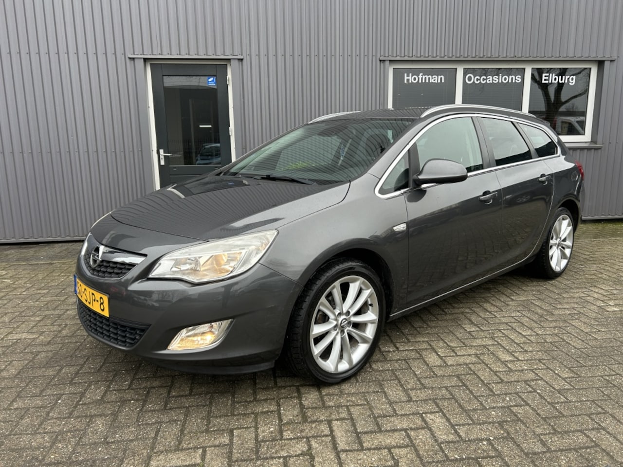Opel Astra Sports Tourer - 1.4 Turbo Cosmo Airco PDC NAVI APK! - AutoWereld.nl