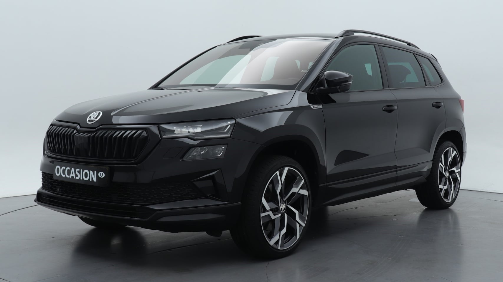 Skoda Karoq - 1.5 TSI 150pk ACT Sportline Business DSG / Navigatie / Stoelverwarming / Camera / Trekhaak - AutoWereld.nl