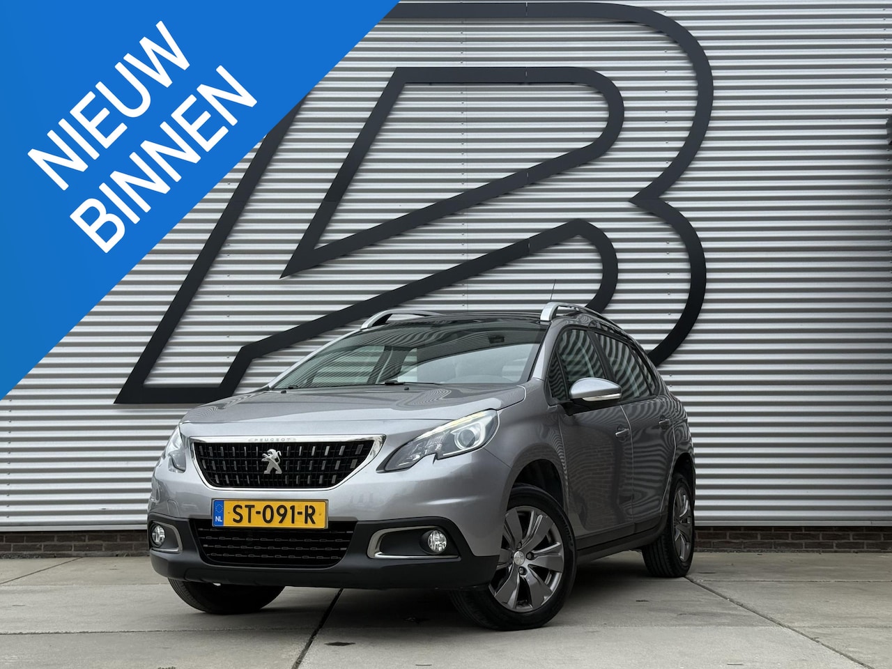 Peugeot 2008 - 1.2 PureTech Blue Lion 2e Eigenaar|Navi|Pano|Trekhaak|Airco|Cruise|PDC|Carplay|N.A.P|APK t - AutoWereld.nl