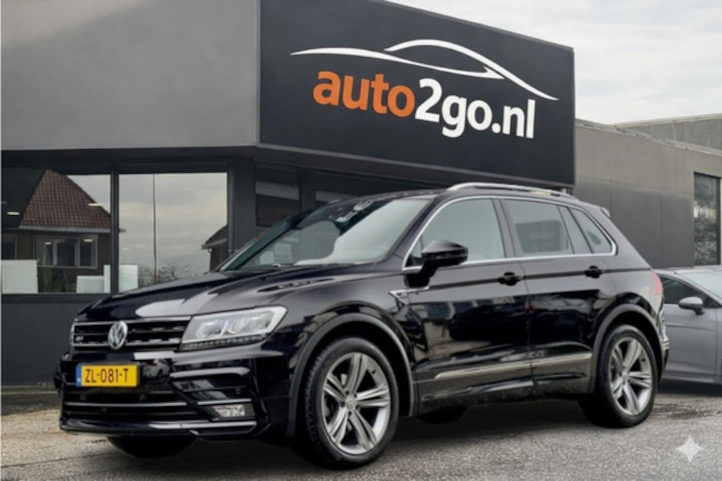Volkswagen Tiguan - 1.5 TSI AUT7 2X R-LINE DESIGNO-INT NAVI DIGI-DASH PARKPILOT APPLE-CARPLAY 20 INCH-LMV PDC - AutoWereld.nl