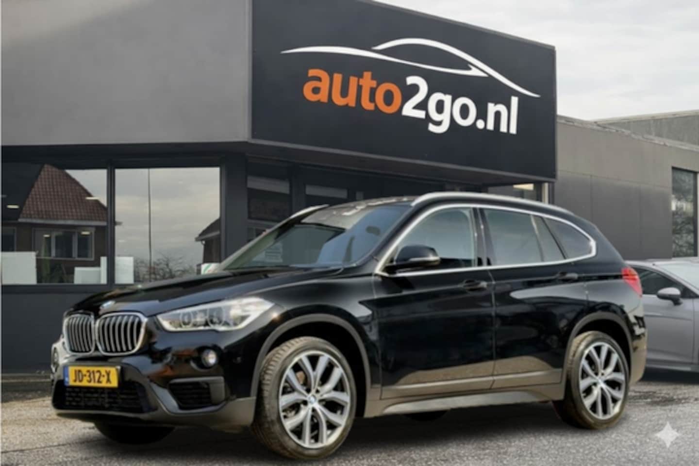 BMW X1 - sDrive16d M-SPORT LEDER NAVI AIRCO PARK-ASSIST 18 INCH-M.VELGEN LED PDC - AutoWereld.nl
