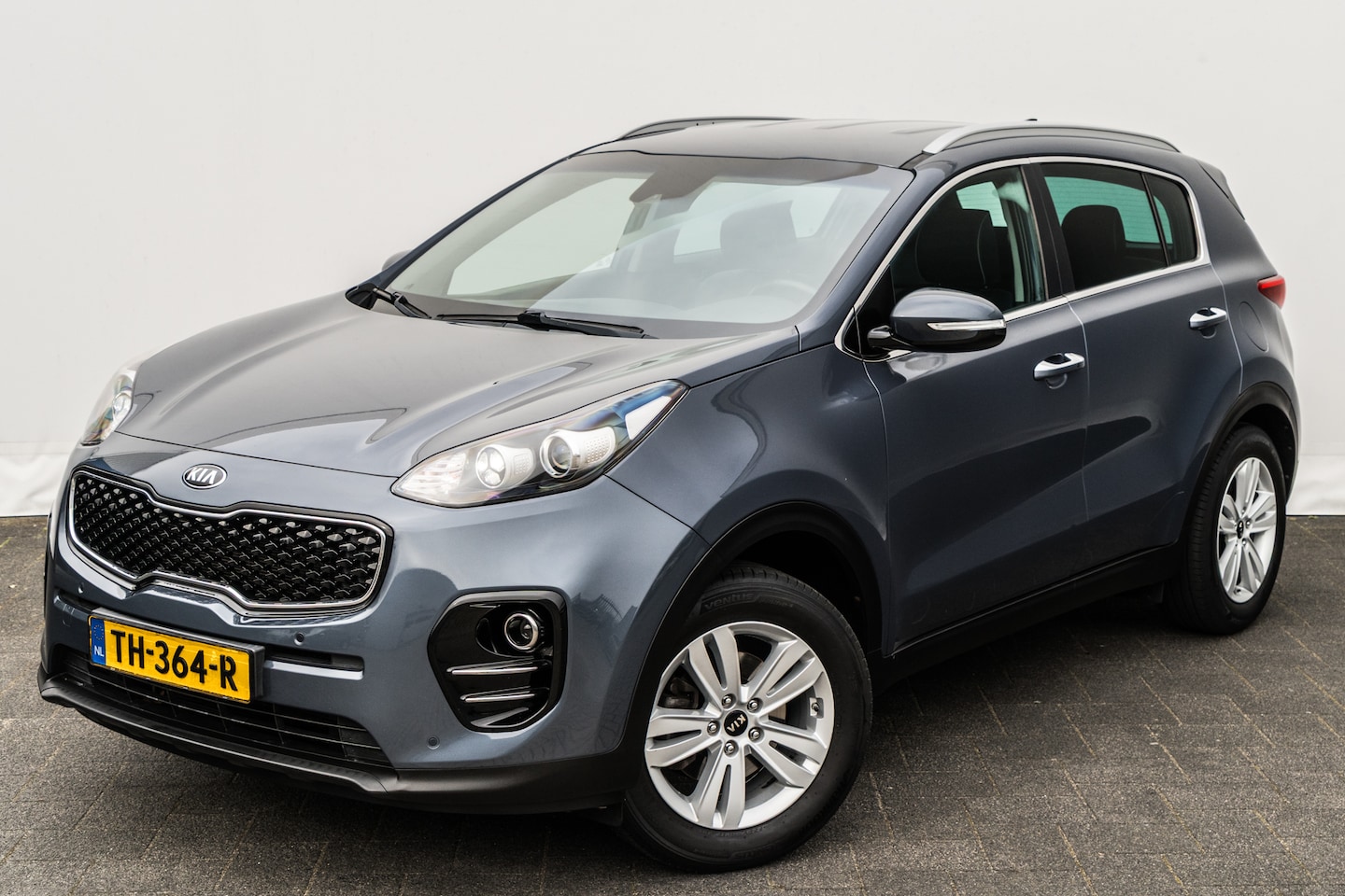 Kia Sportage - 1.6 GDi Design Edition | Elektr. Stoelen | Leder | JBL | Camera | Volledig onderhouden - AutoWereld.nl
