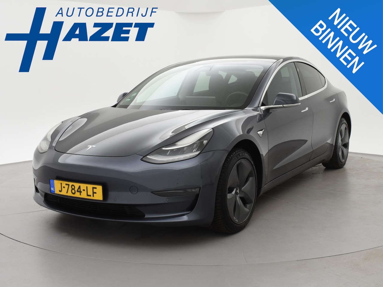 Tesla Model 3 - Long Range RWD LONG RANGE AWD 75 kWh + TREKHAAK | 560 KM WLTP | 1000 KG TREKGEWICHT OP KENTEKEN - AutoWereld.nl