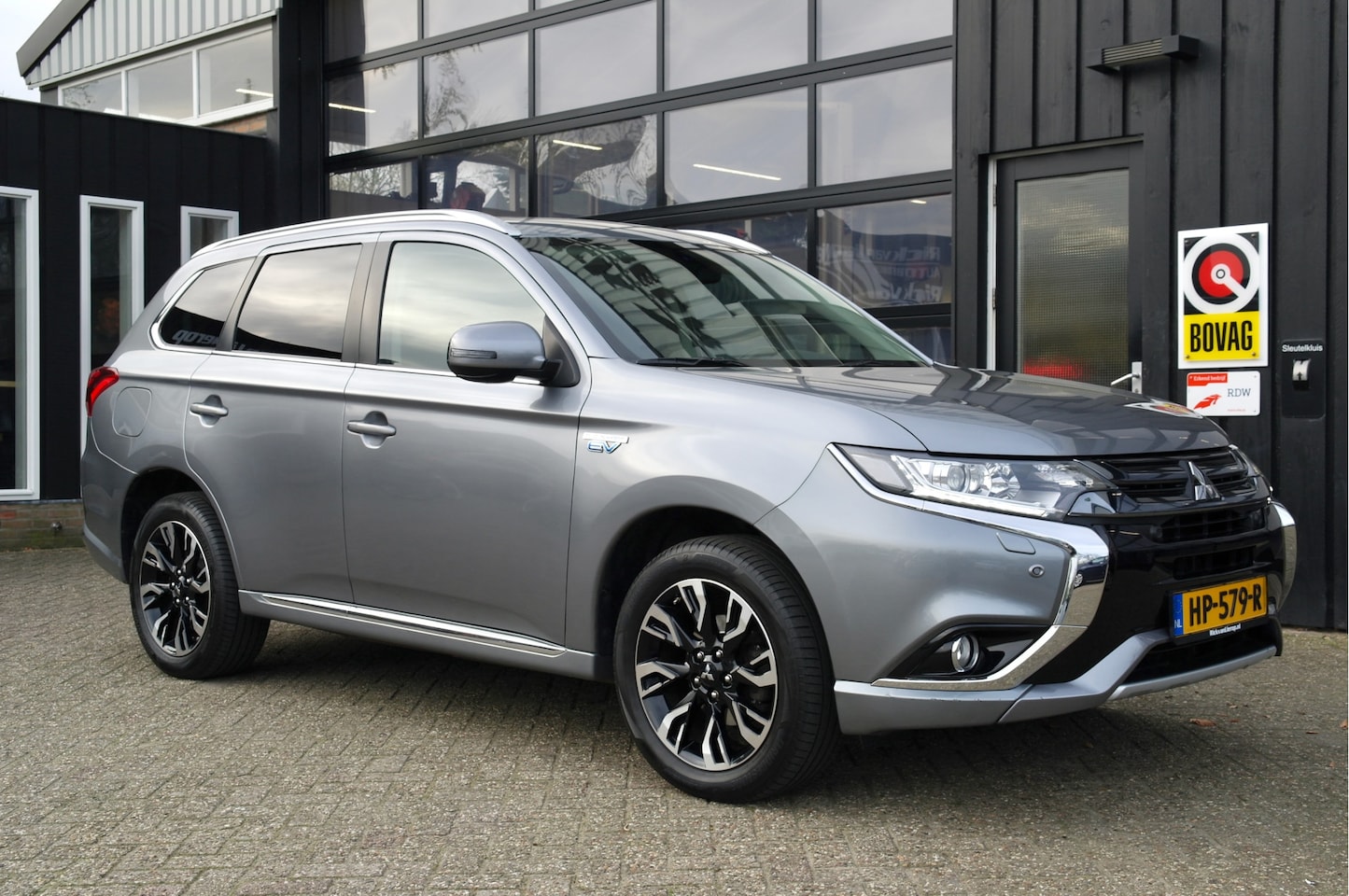 Mitsubishi Outlander - 2.0 PHEV Executive Edition | Leer | Navi | Cruis | BTW-Auto | - AutoWereld.nl