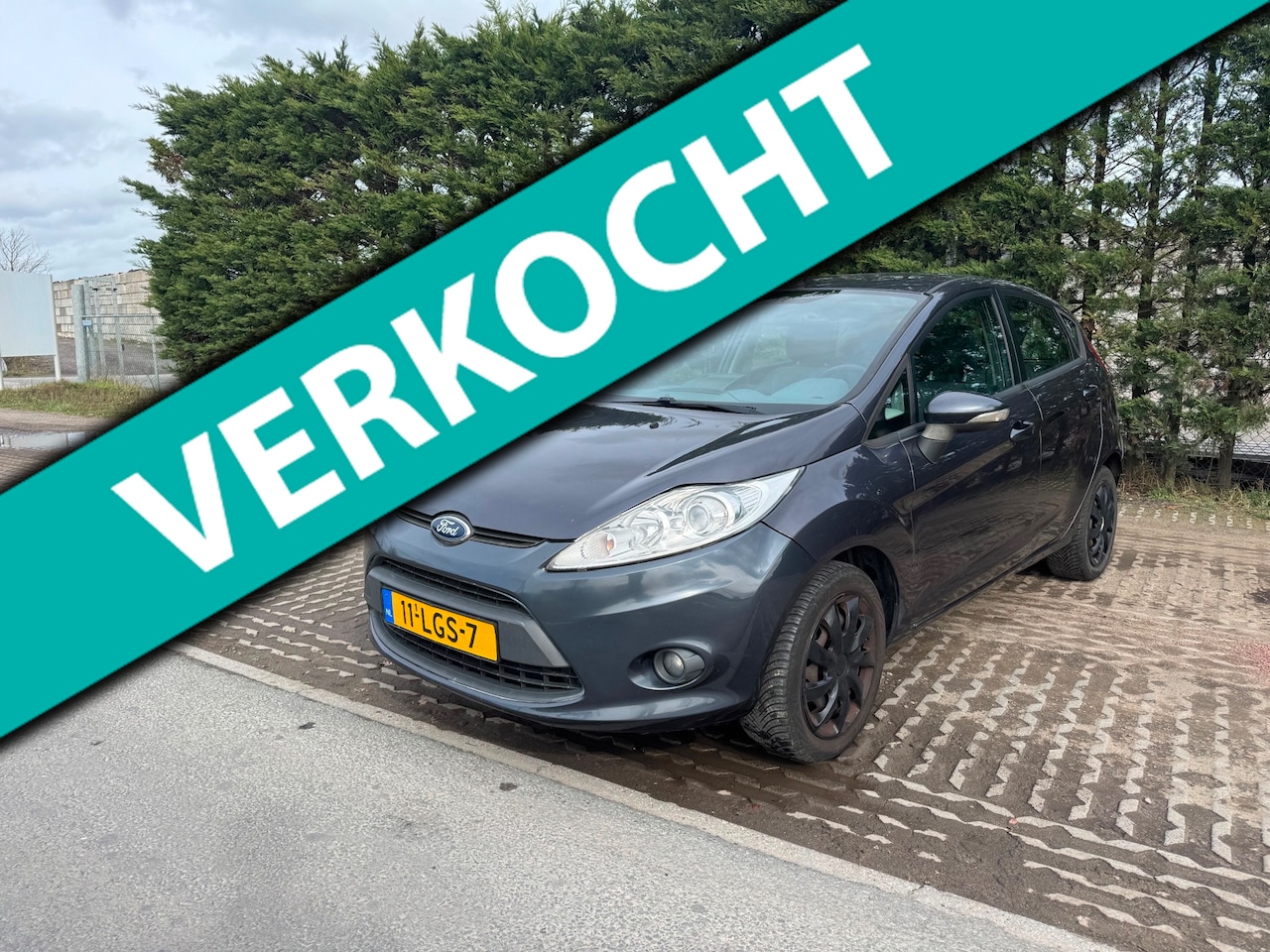 Ford Fiesta - 1.25 Ghia 1.25 Ghia - AutoWereld.nl