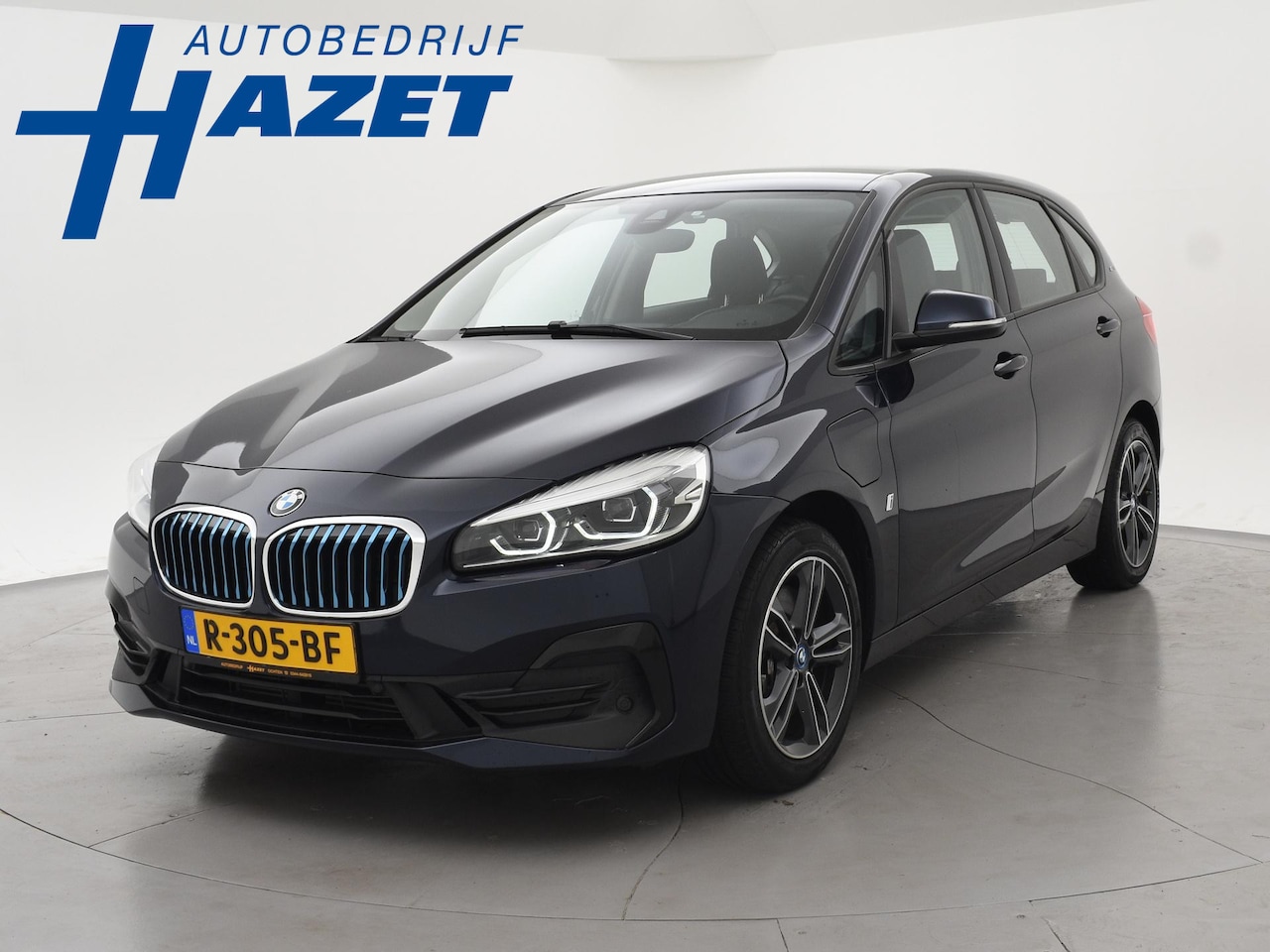 BMW 2-serie Active Tourer - 225xe 224 PK XDRIVE PLUG-IN HYBRID + STOELVERWARMING / AFN. TREKHAAK / NAVIGATIE - AutoWereld.nl