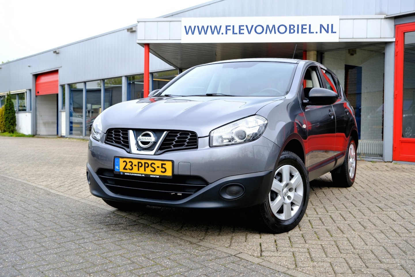 Nissan Qashqai - 1.6 Visia 1e eigenaar|Airco|Cruise|Trekhaak - AutoWereld.nl