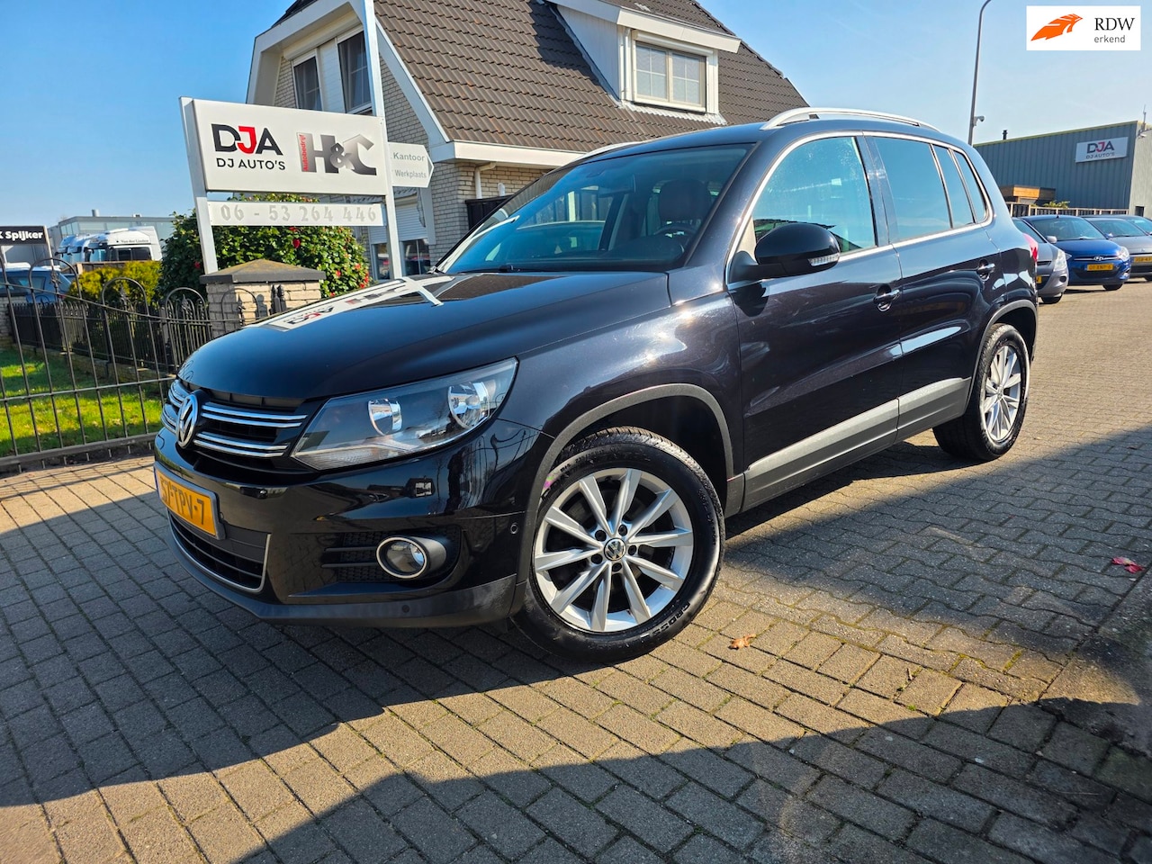 Volkswagen Tiguan - 1.4 TSI Sport&Style - AutoWereld.nl
