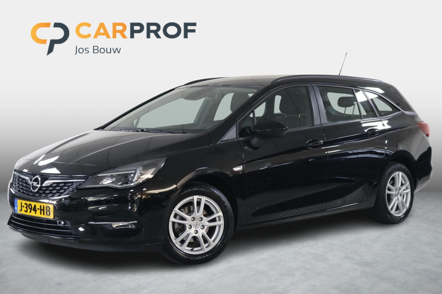 Opel Astra Sports Tourer - 1.2 Business Edition Clima | Carplay | DAB | Cruise | Lichtmetaal - AutoWereld.nl