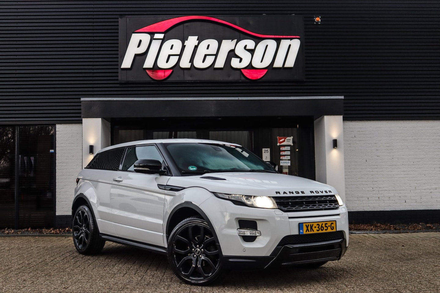Land Rover Range Rover Evoque Coupé - 2.0 Si 4WD KUIPSTOELEN - AutoWereld.nl