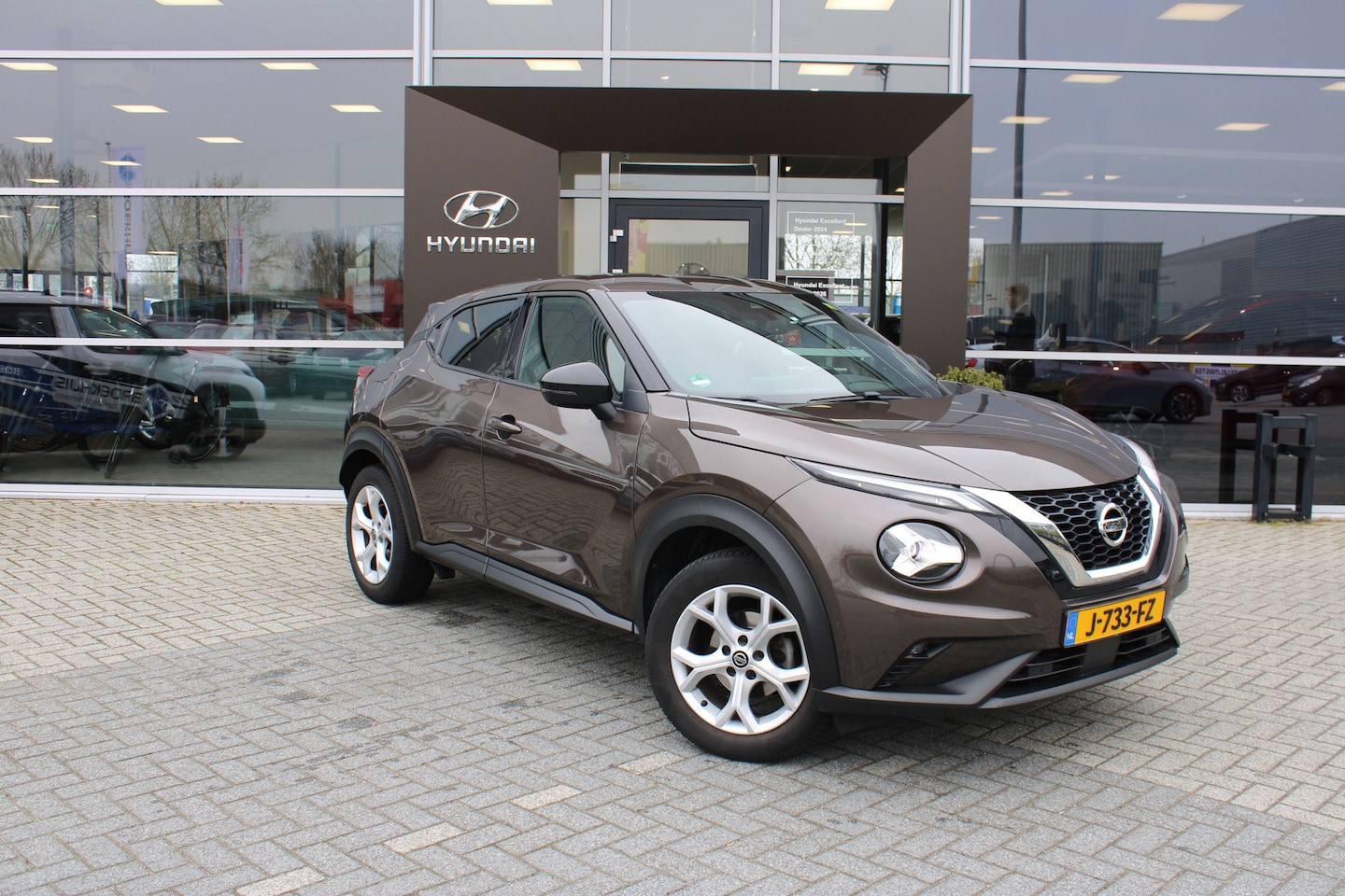 Nissan Juke - 1.0 DIG-T Tekna | 360 Camera | Achterbank in delen neerklapbaar | Achteropkomend verkeer w - AutoWereld.nl