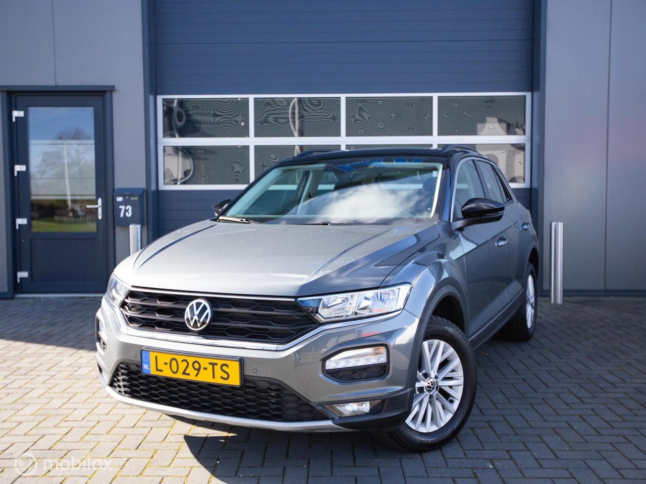 Volkswagen T-Roc - 1.0 TSI Style Business 15DKM!! - AutoWereld.nl