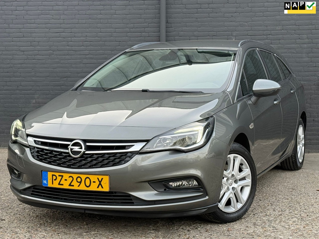 Opel Astra Sports Tourer - 1.0 Business+ NAVI | PDC | TREKHAAK | AIRCO | NWE APK - AutoWereld.nl