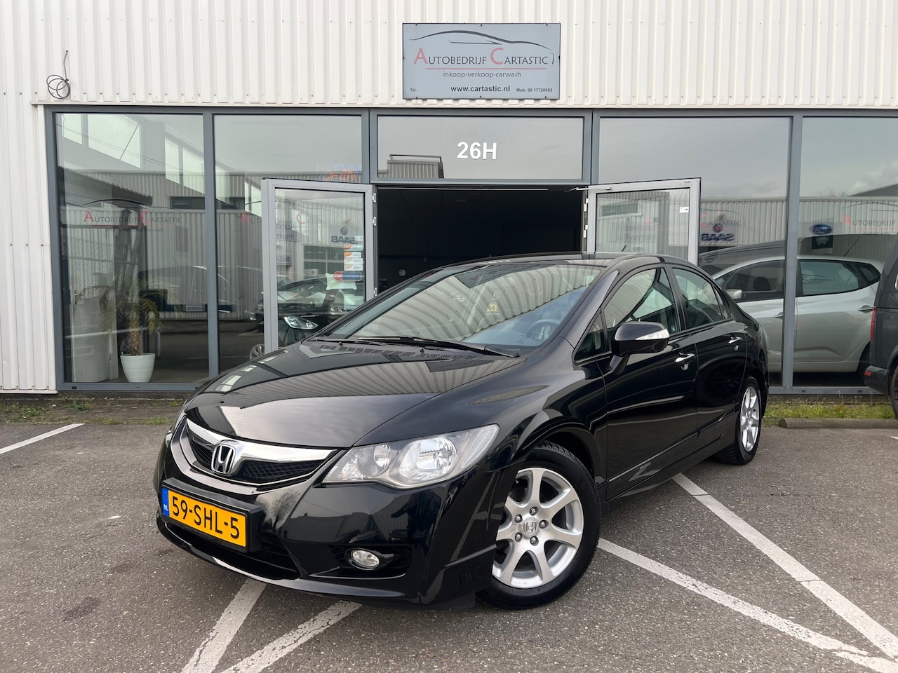 Honda Civic - 1.3 Hybrid Elegance LEER | 1e EIGENAAR | CRUISE | CLIMA | DEALER ONDERHOUDEN | STOELVERWAR - AutoWereld.nl