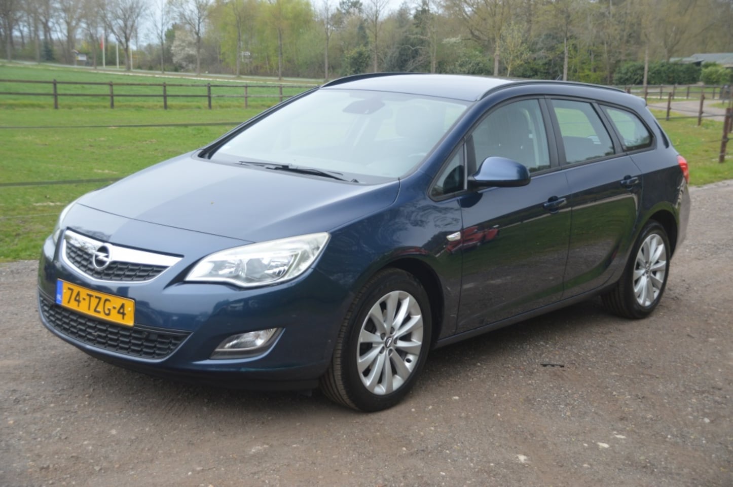 Opel Astra Sports Tourer - 1.4 Turbo Clima Cruise Navi PDC - AutoWereld.nl
