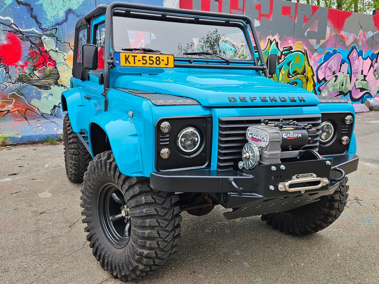 Land Rover Defender 90 - soft top custom 2.4 TD 4 zits Miami Blue - AutoWereld.nl
