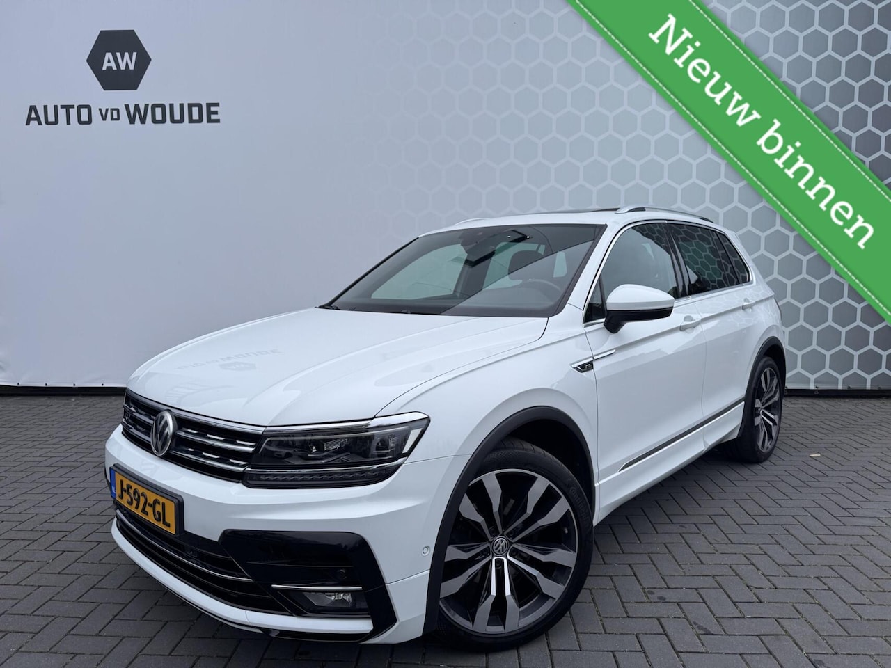 Volkswagen Tiguan - 2.0 TDI Highline Business R Dynaudio PANO Trekhaak - AutoWereld.nl