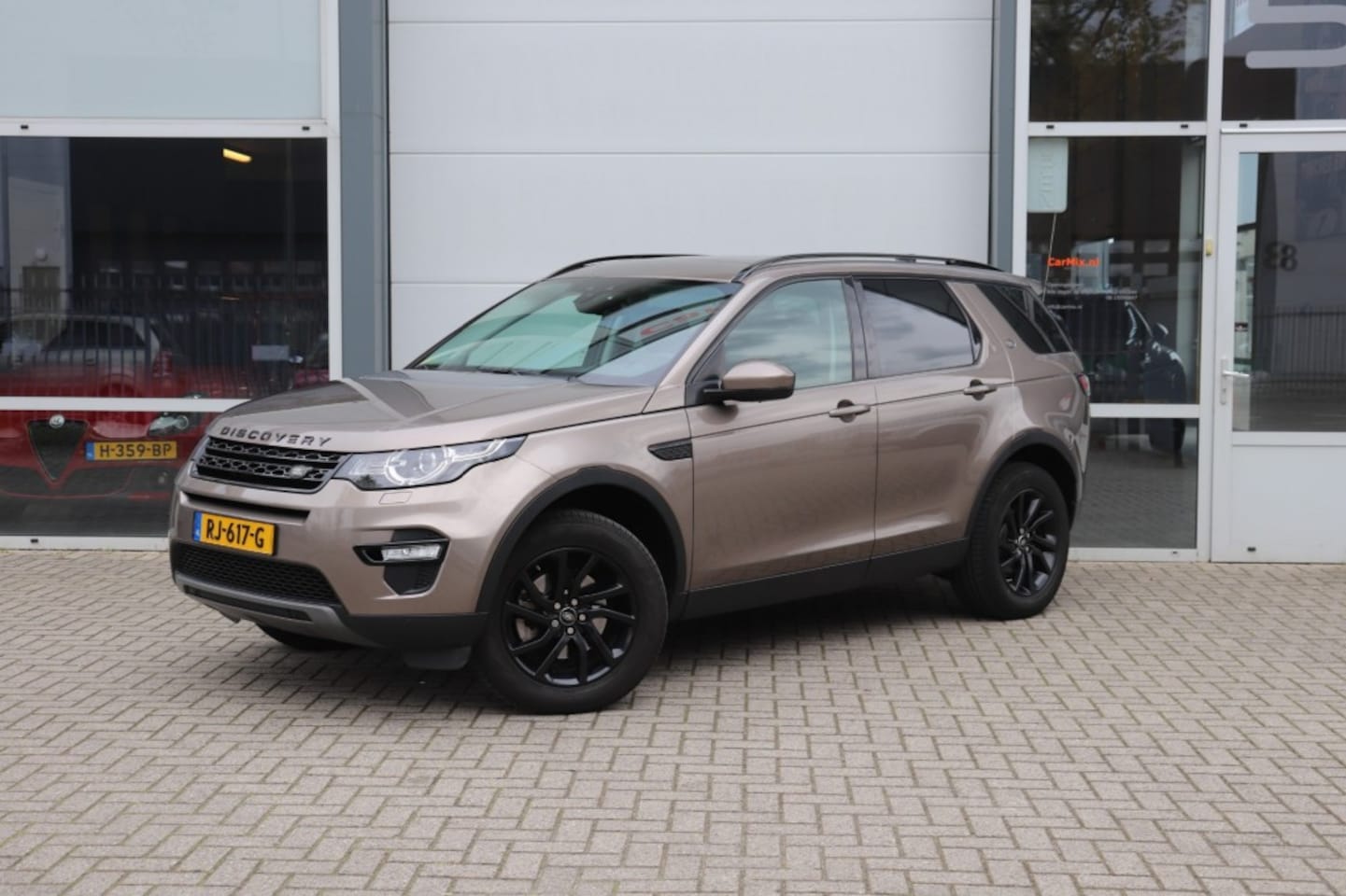 Land Rover Discovery Sport - 2.0 TD4 AUT HSE LUXURY/ NWE KETTING / ORIG.NL / GEDOCUMENTEERD - AutoWereld.nl