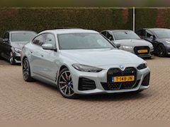 BMW i4 - eDrive40 High Executive 84 kWh / SoH 93, 5% / Trekhaak / 360Camera / Head-up / Leder / 19'