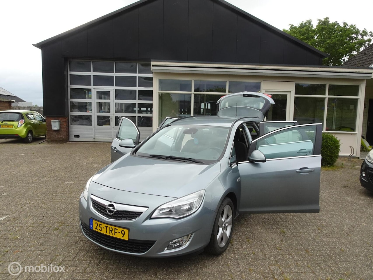 Opel Astra Sports Tourer - Tourer(CLIMA/CRUISE CONTROLL/TREKHAAK) 1.4 Turbo Edition - AutoWereld.nl