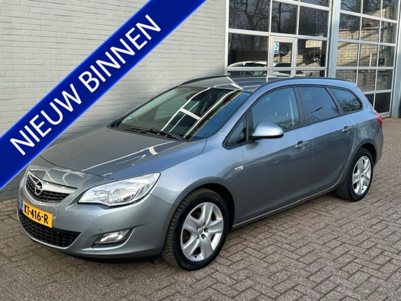 Opel Astra Sports Tourer - 1.4 Edition / Stuur+stoel verwarming / Trekhaak - AutoWereld.nl