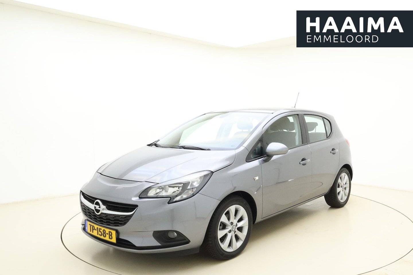 Opel Corsa - 1.4 16v 90pk 5drs Favourite | Navigatie | Airco | Cruise control | Lichtmetalen velgen | P - AutoWereld.nl