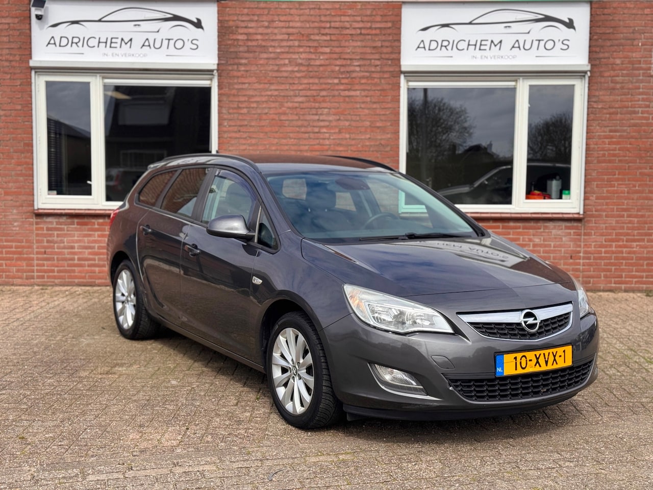 Opel Astra Sports Tourer - 1.4 Turbo Anniversary Edition 1.4 Turbo Anniversary Edition - AutoWereld.nl