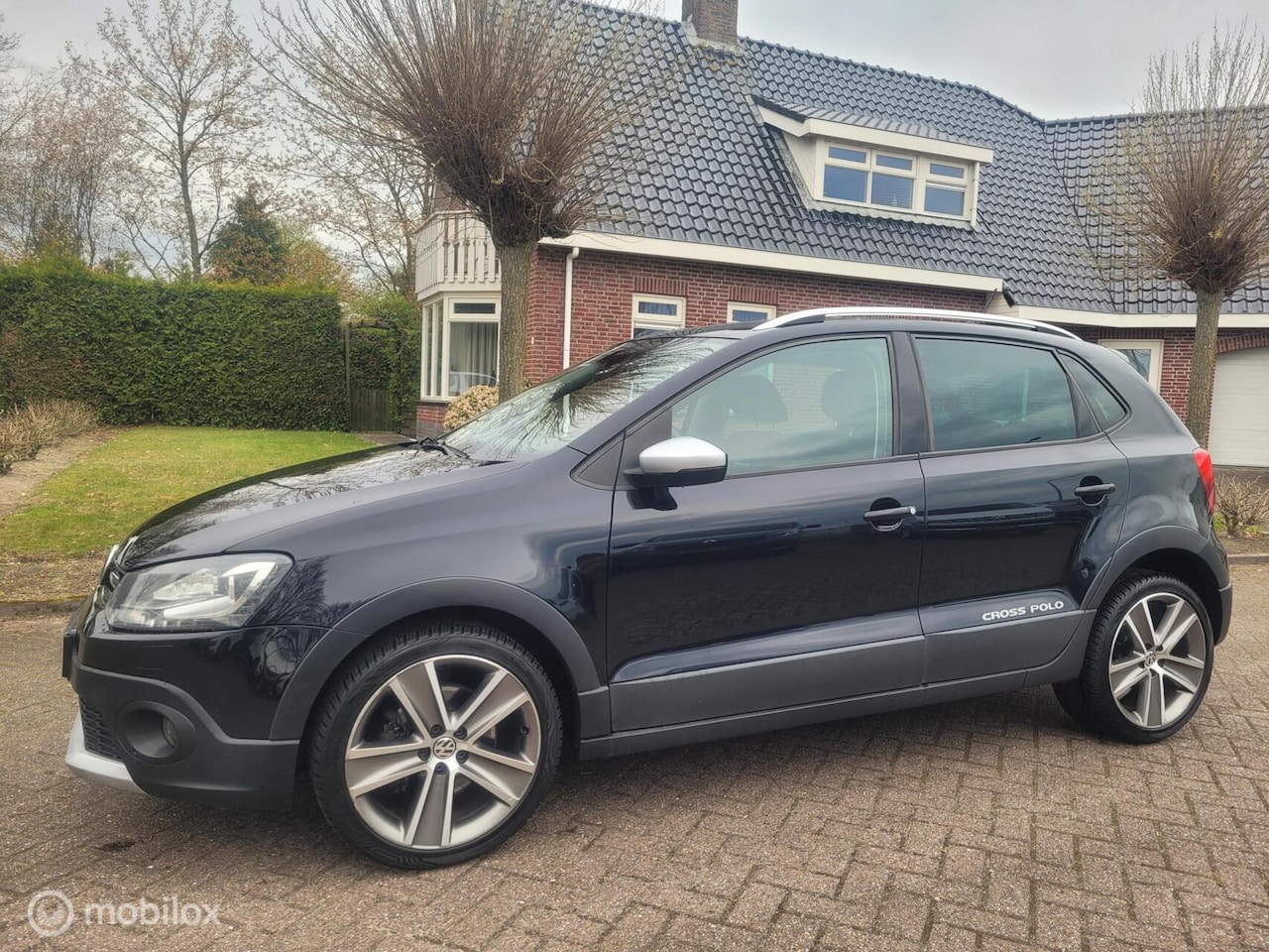 Volkswagen Polo - 1.2 TSI Cross clima/navi/lm/pdc/lm. - AutoWereld.nl