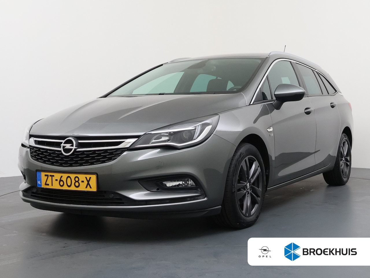 Opel Astra Sports Tourer - 1.4 Turbo 120 Jaar Edition | Achteruitrijcamera | Apple Carplay/Android Auto|telefooninteg - AutoWereld.nl