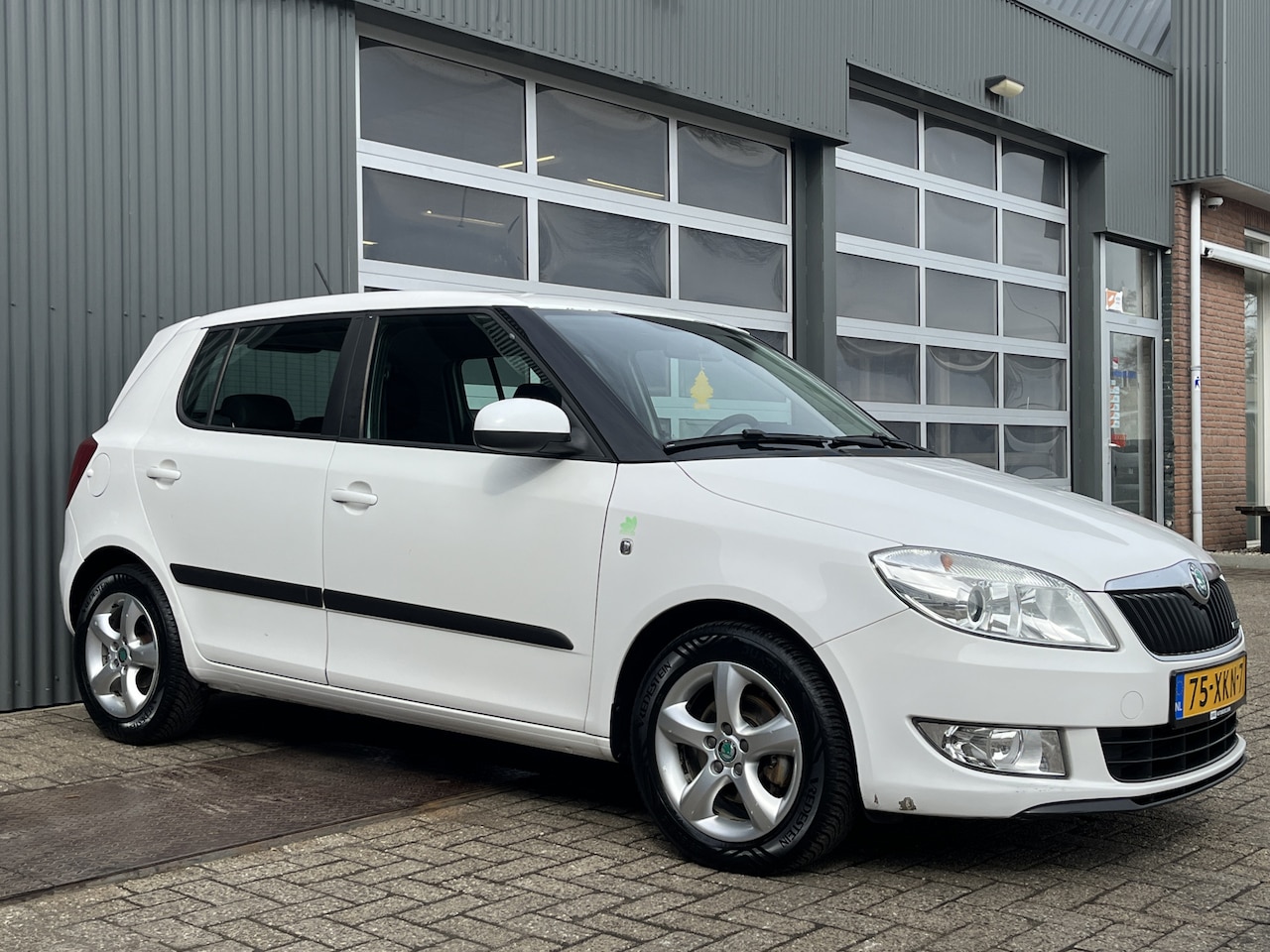 Skoda Fabia - 1.2 TDI Greenline Airco Cruise controle Navigatiesysteem Telefoonverbinding - AutoWereld.nl