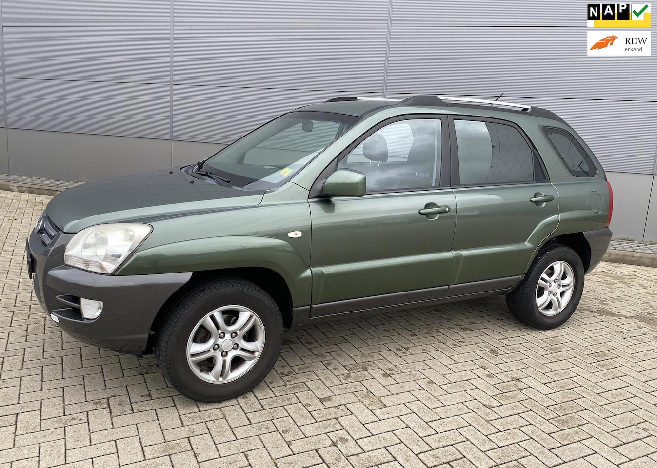 Kia Sportage - 2.0 CVVT X-ecutive 2.0 CVVT X-ecutive - AutoWereld.nl