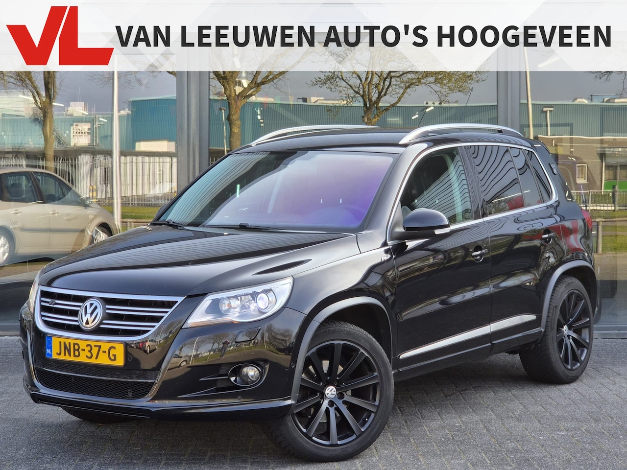 Volkswagen Tiguan - 2.0 TSI Sport&Style 4Motion | Nieuw binnen | Lederen bekleding | Stoelverwarming | Trekhaa - AutoWereld.nl