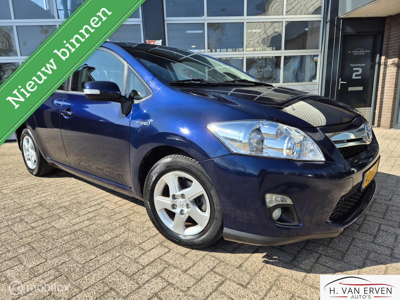 Toyota Auris - 1.8 Full Hybrid Aspiration CRUISE PDC NAP - AutoWereld.nl