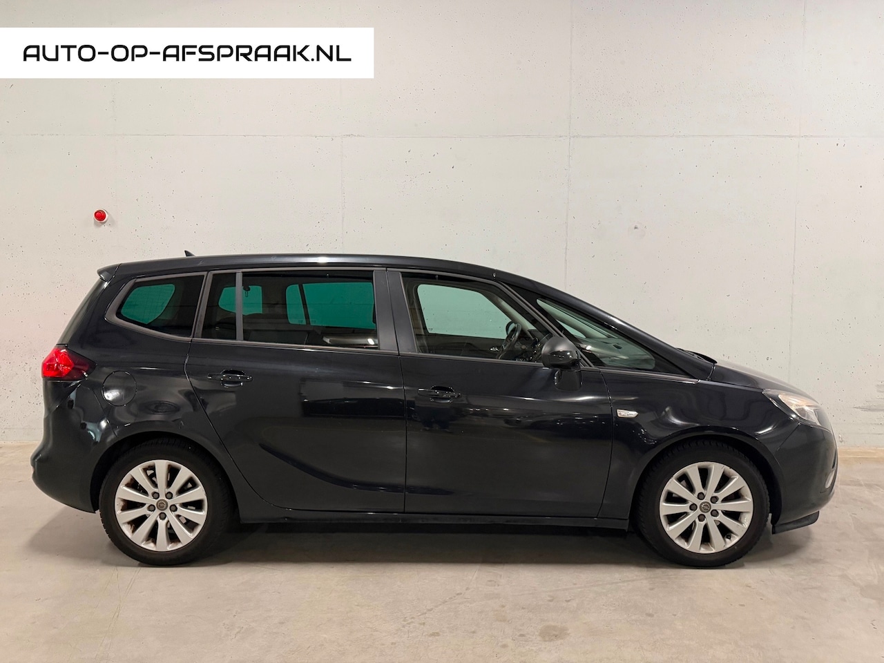 Opel Zafira Tourer - 1.4 Cosmo 7p. Navi Camera Cruise Airco Trekhaak - AutoWereld.nl