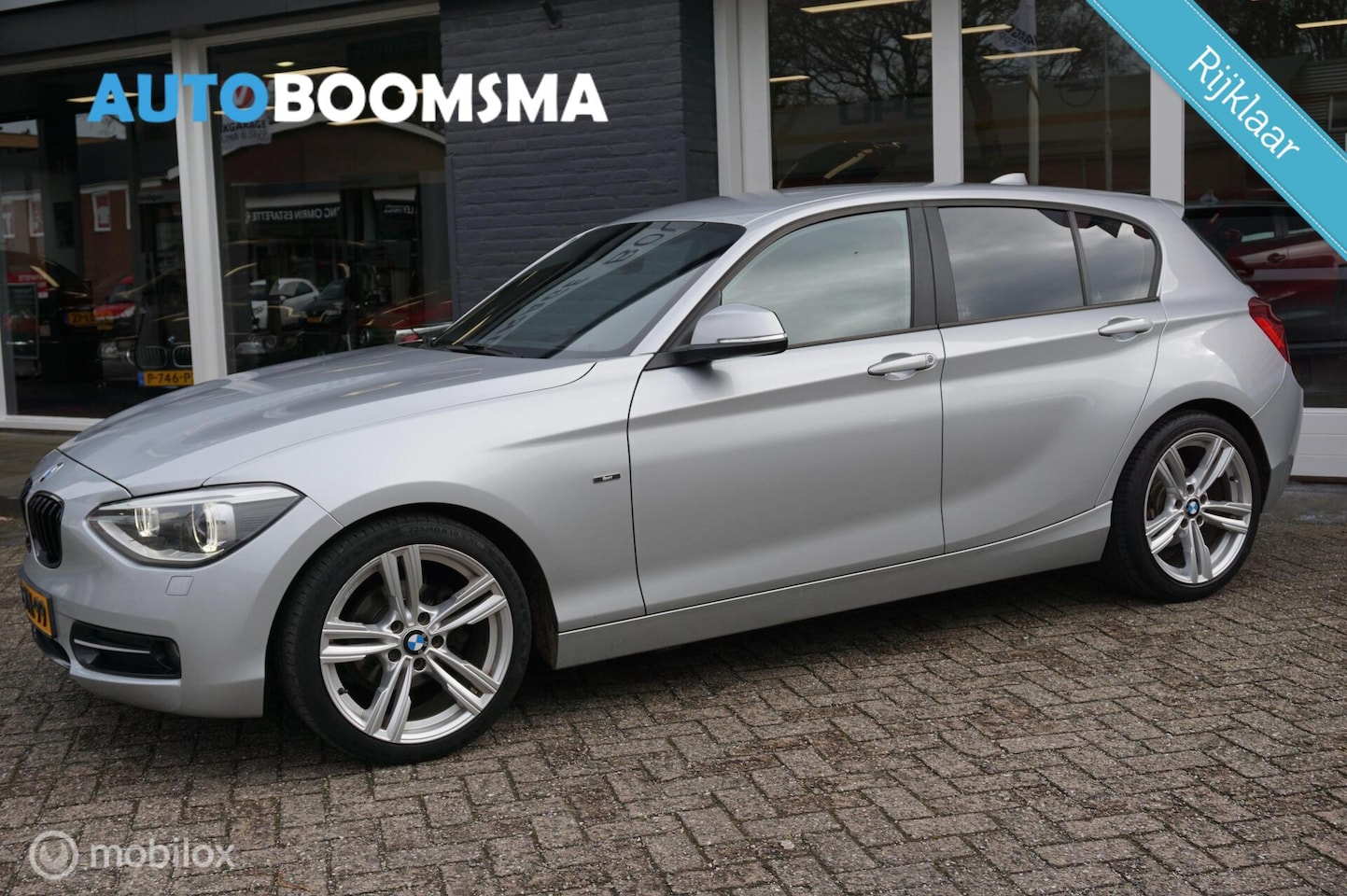 BMW 1-serie - 114i 185pk 5drs Sport Navi Clima Cruise 18" Led - AutoWereld.nl
