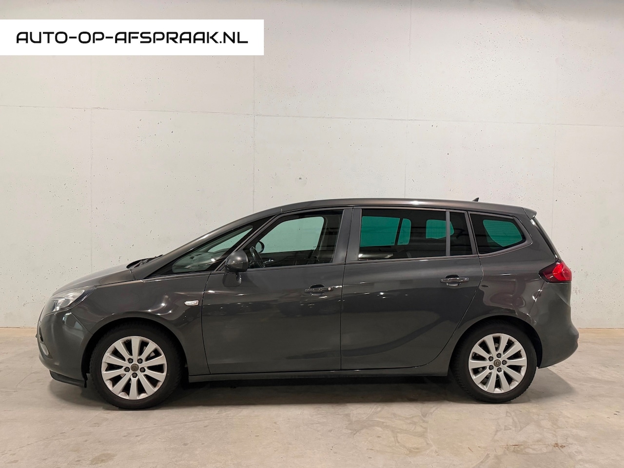 Opel Zafira Tourer - 1.4 Cosmo 7p. Navi Camera Airco Trekhaak Cruise - AutoWereld.nl