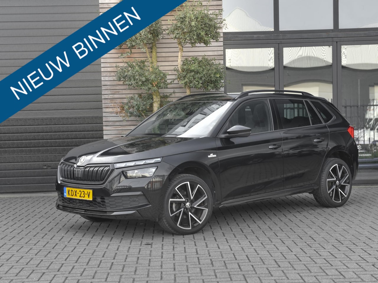 Skoda Kamiq - 1.0 TSI Monte Carlo Panoramadak Trekhaak 18 inch velgen Clima Cruise Stoelverwarming - AutoWereld.nl