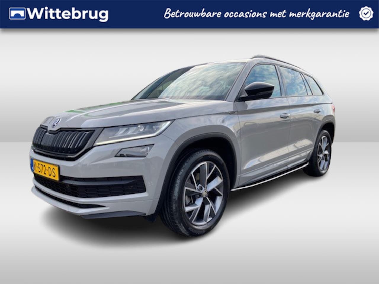 Skoda Kodiaq - 1.5 TSI Sportline Business / Steel Grey / Elek. Trekhaak / Navi / Camera / Memory - AutoWereld.nl
